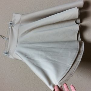 Khaki, beige,tan A line skater size small, red hanger